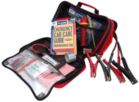 An open car emergency kit with jumper cables, a tire pressure gauge, duct tape, a reflector, an emergency car care guide, and a maintenance log. The kit is red with a black zipper and has various compartments. An open car emergency kit with jumper cables, a tire pressure gauge, duct tape, a reflector, an emergency car care guide, and a maintenance log. The kit is red with a black zipper and has various compartments.